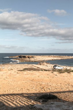 Winter sun and shadows on Buggiba's bay
