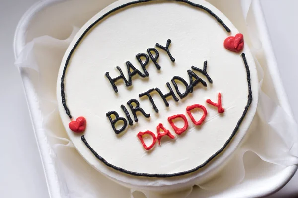 Happy birthday cake. Happy birthday cake background. Happy birthday cake on a white background. Birthday cake for dad with the words \