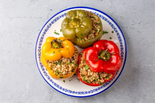 Stuffed peppers made with colorful bell peppers. A delicious stuffed pepper with bulgur and meat.