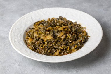 Traditional delicious Turkish food; hibiscus - malva dish (Turkish name; Ebe gumeci - ebegumeci yemegi, kavurma)