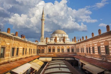 Awesome view of Kizlaragasi Han Caravanserai and Hisar Mosque in Izmir, Turkey. Izmir is a popular tourist destination in Turkey.