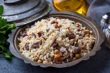Traditional Turkish food; Roasted meat on rice (Turkish name; pilav ustu kavurma, kurban kavurma, nohutlu etli pilav) 