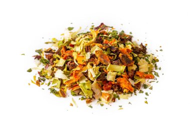 Dry cut and chopped up vegetables mix, spice isolated on white background