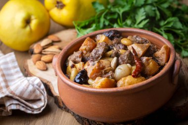 Traditional delicious Turkish foods; Quince and plum lamb stew, lamb tandoori (Turkish name; Ayvali - erikli kuzu guvec - kuzu tandir