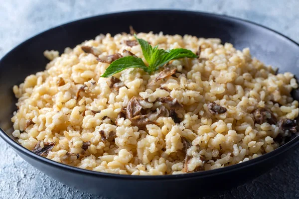 Türk yemekleri; Mantarlı Bulgur pilavı (Türkçe adı; mantarlı bulgur pilavi)