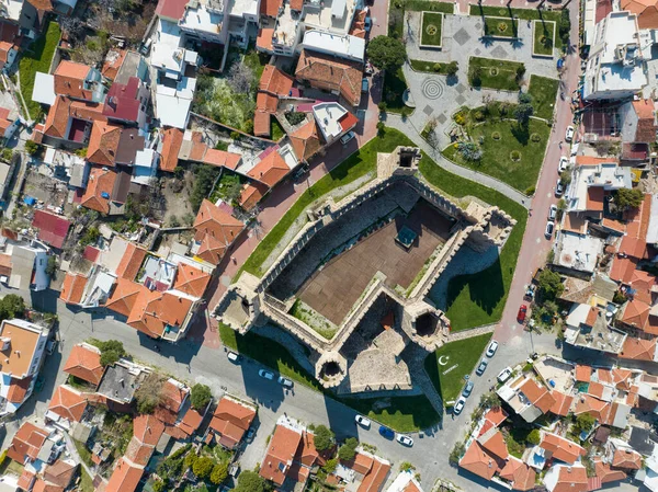 Ancient, old castle view with aerial drone. Now the castle in Candarli district of Izmir; Candarli Kalesi - Turkey