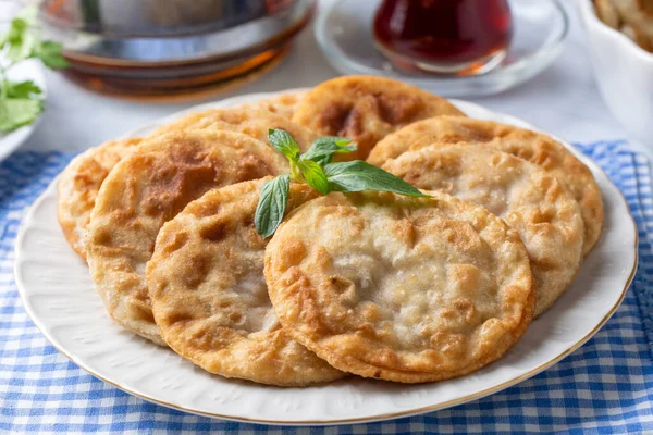 Stock image Delicious meat pie from Turkish cuisine. Fried handmade pies. Turkish name; fincan boregi or puf borek