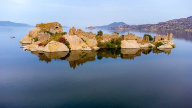 Lake Bafa, Kapikiri island - Kapikiri Village and island - Herakleia Ancient City - Turkey clipart