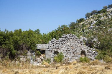 Türkiye 'deki Sidyma Antik Kenti. Antik Sidyma Sitesi 'ndeki kaya mezarları, Mugla, Türkiye