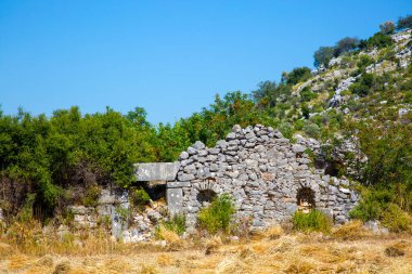 Türkiye 'deki Sidyma Antik Kenti. Antik Sidyma Sitesi 'ndeki kaya mezarları, Mugla, Türkiye
