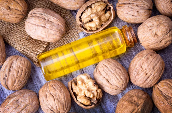 Cosmetic and therapeutic walnut oil. Food and cosmetic concept photo.