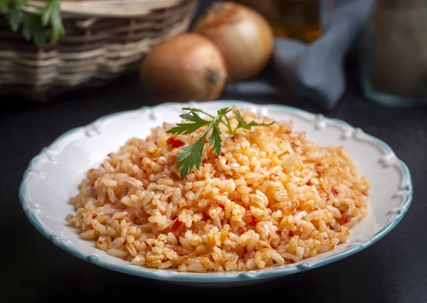 Stock image Traditional delicious Turkish food; rice pilaf with tomatoes (Turkish name; Domatesli pirinc pilavi)