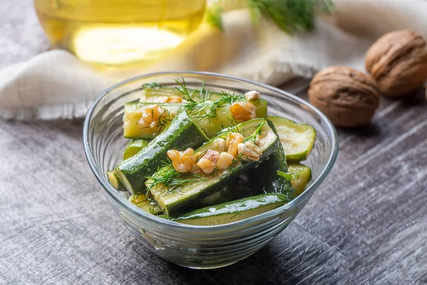 Green zucchini salad with walnuts and dill, Turkish appetizer - meze