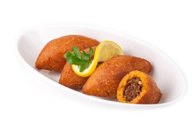 Kibbeh, Orta Doğu mutfağında (Türkçe: icli kofte) popüler bir yemektir.)