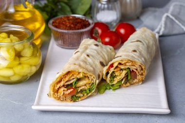 Pita bread lavash roll chicken doner kebab and fresh vegetables - Durum Chicken Doner Kebab