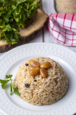 Traditional delicious Turkish food; rice pilaf with pine nuts and currants (Turkish name; bademli ic pilav or pilaf)