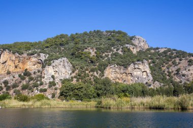 Kaunos Dalyan 'daki kaya kesimli tapınak mezarları - Türkiye (Türkçe adı; kaya mezarları) Antik Dalyan vadisi Kaunos kenti, Türkiye. Kaunos (Latince: Caunus), Anadolu 'da bir şehirdir.