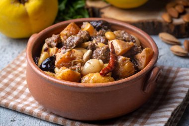 Traditional delicious Turkish foods; Quince and plum lamb stew, lamb tandoori (Turkish name; Ayvali - erikli kuzu guvec - kuzu tandir