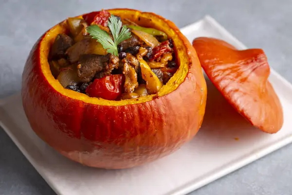 Stuffed pumpkin stew with meat and vegetables