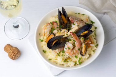 Mediterranean risotto with shrimps, mussels, octopus and clams. Seafood risotto