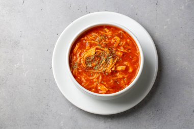 Chicken noodle soup with tomato. Turkish name; Domatesli tavuklu sehriye corbasi