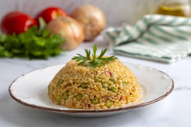 Bezelyeli Bulgur pilavı; Türkçe adı; Bezelyeli bulgur pilavi