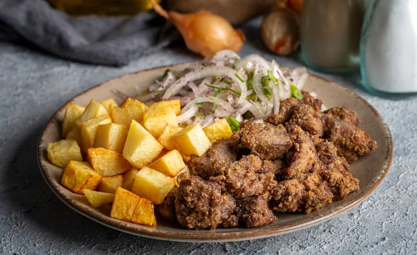 stock image Liver pan (Albanian liver) Turkish traditional food. Liver over rice. (Turkish name; arnavut ciger)