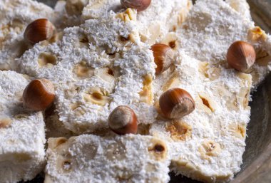 Traditional delicious Turkish dessert; cezerye with hazelnuts and coconut (Turkish name; Findikli madonna)