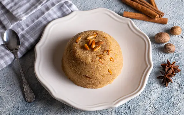 Traditional Turkish desserts; Semolina halva with orange (Turkish name; portakalli irmik helvasi)