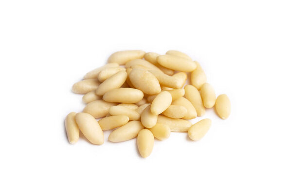 Healthy pine nuts isolated on white background.