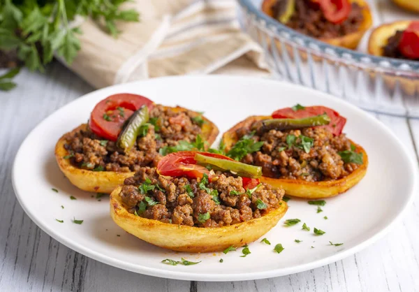 Traditional Turkish food; baked potato dish with minced meat, Turkish name; Patates karniyarik