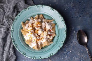 Traditional Turkish cuisine; Turkish ravioli, Turkish name; Manti, ucgen manti