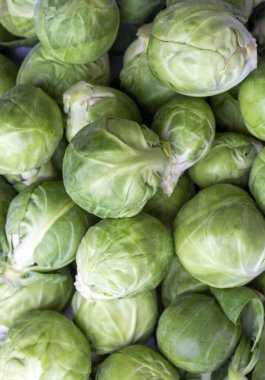 Green fresh brussels sprouts on the white background