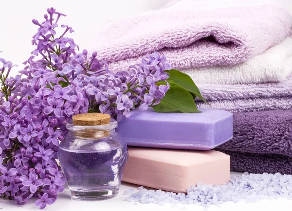 Lilac nature cosmetics, handmade preparation of essential oils, perfume, creams, soaps from fresh and lilac flowers
