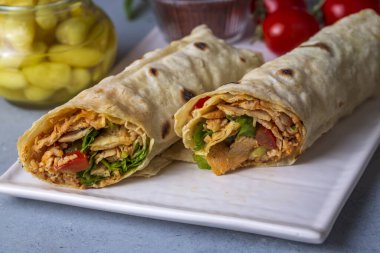 Pita bread lavash roll chicken doner kebab and fresh vegetables - Durum Chicken Doner Kebab