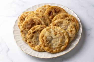 Delicious meat pie from Turkish cuisine. Fried handmade pies. Turkish name; fincan boregi or puf borek