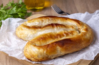 Turkish Kol Borek with minced meat serving