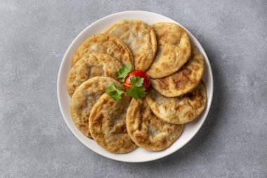 Delicious meat pie from Turkish cuisine. Fried handmade pies. Turkish name; fincan boregi or puf borek