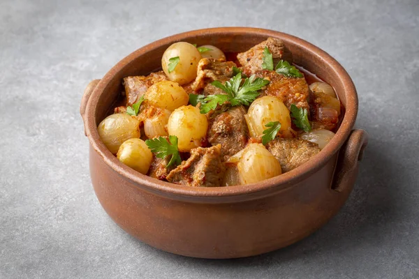 Traditional Greek dish of beef stifado in a sauce. Meat stew, onion stew. Turkish name; sogan yahni or et yahni