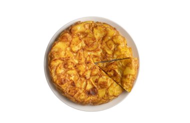 Spanish omelette with potatoes, typical spanish cuisine on gray concrete floor. Tortilla Espanola. Turkish name; Yumurtali patates