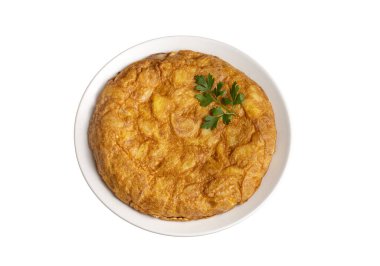 Spanish omelette with potatoes, typical spanish cuisine on gray concrete floor. Tortilla Espanola. Turkish name; Yumurtali patates