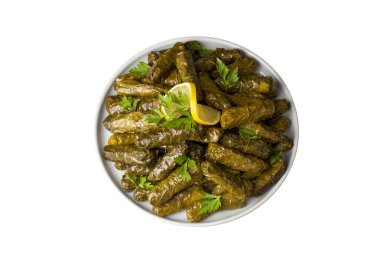 Lezzetli dolma (sarma) doldurulmuş üzüm yaprağı pilav, beyaz yoğurt sosu. Lübnan Dolma Sarması tabakta. Lübnan Türk mutfağı, Yunan ortadoğu mutfağı. (Türkçe adı: Yaprak sarma)