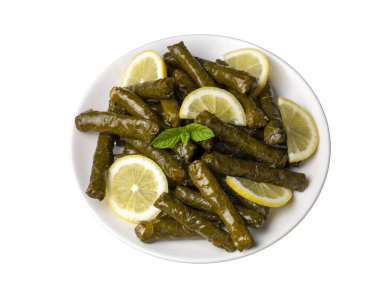 Lezzetli dolma (sarma) doldurulmuş üzüm yaprağı pilav, beyaz yoğurt sosu. Lübnan Dolma Sarması tabakta. Lübnan Türk mutfağı, Yunan ortadoğu mutfağı. (Türkçe adı: Yaprak sarma)
