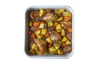 Baked chicken thighs and fried potatoes look delicious.