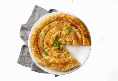 Traditional Turkish pastry with spinach. (Turkish Name: Ispanakli Kol Boregi, Bosnak boregi). Handmade pastry with spinach filling.