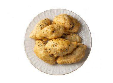 Türk mutfağı; El yapımı peynirli ıspanaklı hamur işi (Türkçe adı; peynirli - ispanakli pogaca, pisi)