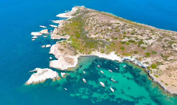 Siren rocks in Greek mythology, a creature half bird and half woman who lured sailors to destruction by the sweetness of her song at Phokaia (Foca ), izmir, Turkey. Aerial photography with drone