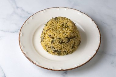 Bitkisel bulgur pilavı. Van bölgesinden 