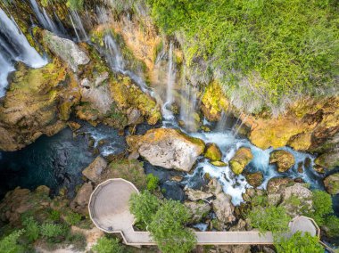 Yerkopru Waterfall and canyon on Goksu Waterfall River is located in a small town named Hadim of Konya province in Eastern Mediterranean region of Turkey. clipart