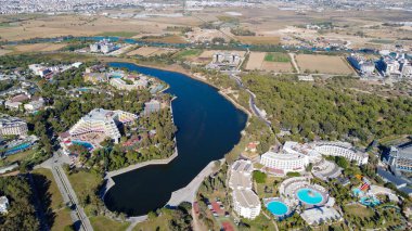 Lake Titreyengol. A trembling lake. Sorgun. Side.The resort village of Titreyengol on the shores of a trembling lake in Turkey.  clipart